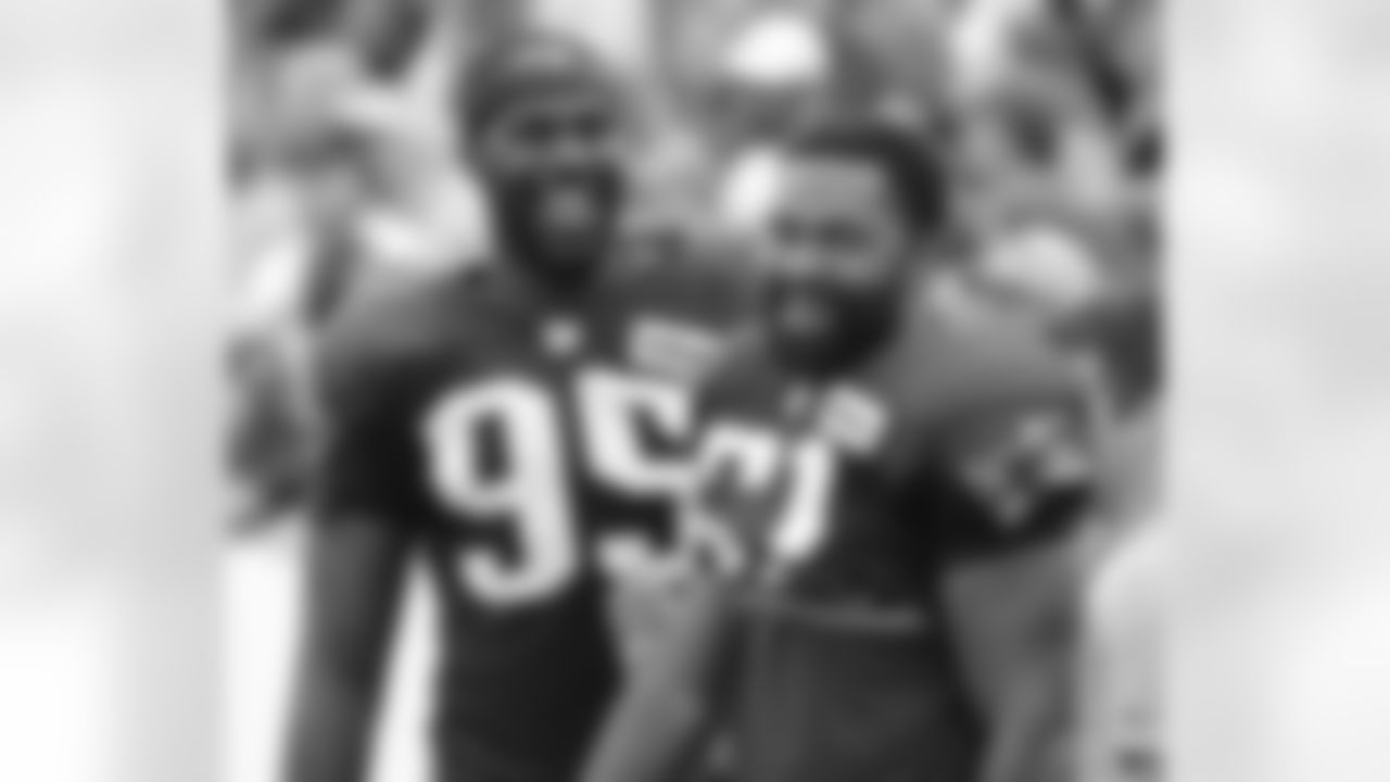New England Patriots defensive end Chandler Jones (95) shares a laugh with teammate middle linebacker Jerod Mayo (51) during a joint practice between the Patriots and New Orleans Saints at the Saint's NFL football training camp in White Sulphur Springs, W.Va., Thursday, Aug. 20, 2015. (AP Photo/Steve Helber)