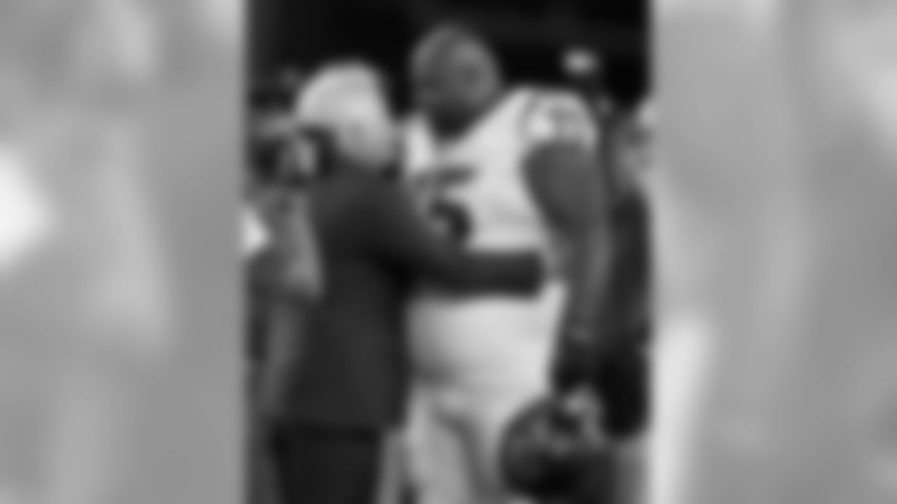 New England Patriots owner Robert Kraft, left, speaks to Houston Texans nose tackle Vince Wilfork before an NFL football game Thursday, Sept. 22, 2016, in Foxborough, Mass. (AP Photo/Charles Krupa)
