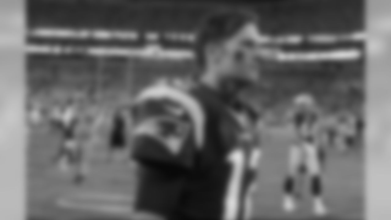 New England Patriots' Tom Brady (12) walks off the field after a preseason NFL football game against the Carolina Panthers in Charlotte, N.C., Friday, Aug. 26, 2016. (AP Photo/Mike McCarn)