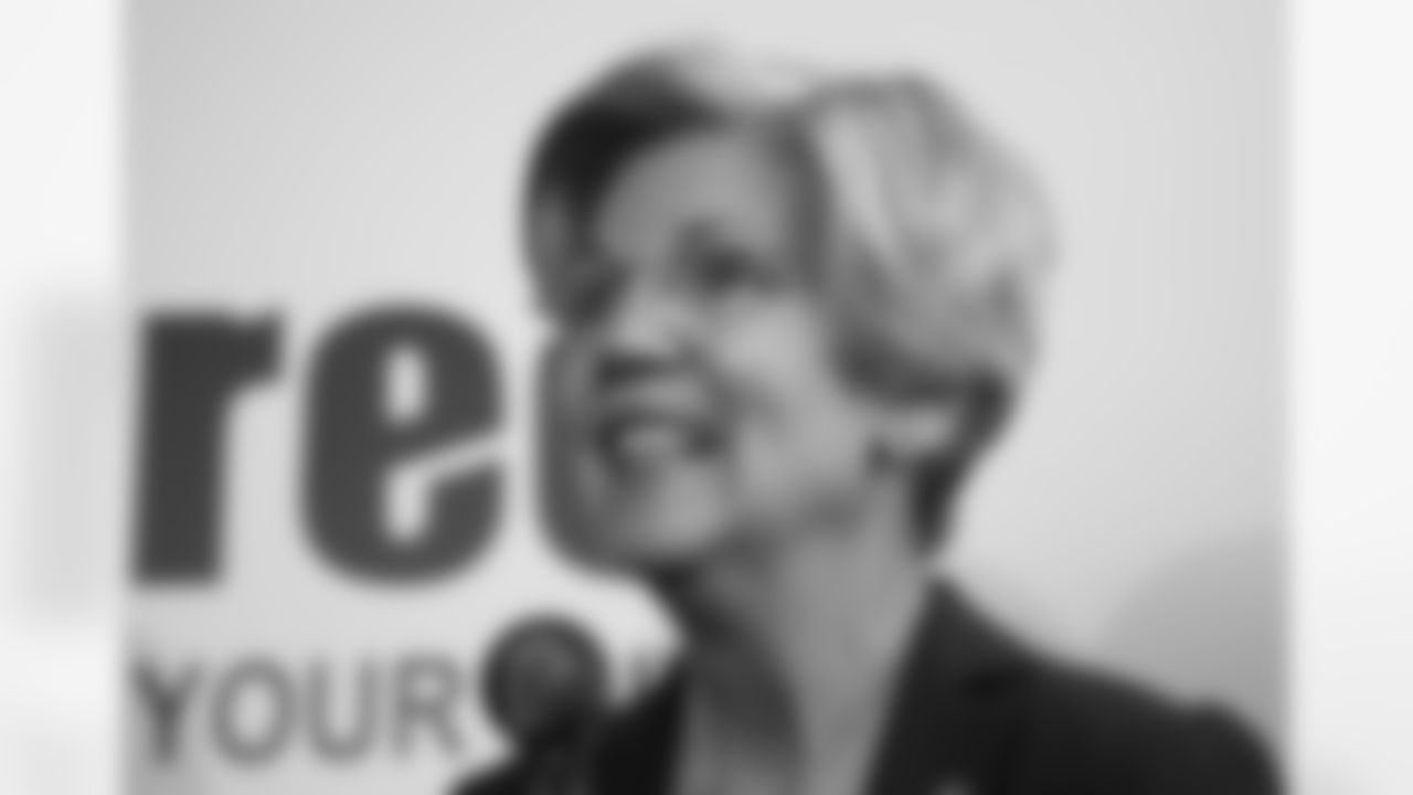 In this March 3, 2017, photo, Sen. Elizabeth Warren, D-Mass., listens to a question during a news conference in Lawrence, Mass. Warren regularly critiques an economic system she says is rigged against the little guy. Fueling that message is a voracious fundraising machine that's turned the Massachusetts Democrat into a powerhouse in her party. (AP Photo/Elise Amendola)