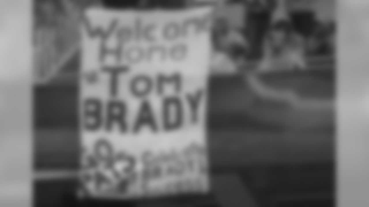New England Patriots fans hold up a sign for quarterback Tom Brady during the second half of an NFL football game between the San Francisco 49ers and the New England Patriots in Santa Clara, Calif., Sunday, Nov. 20, 2016. (AP Photo/Ben Margot)