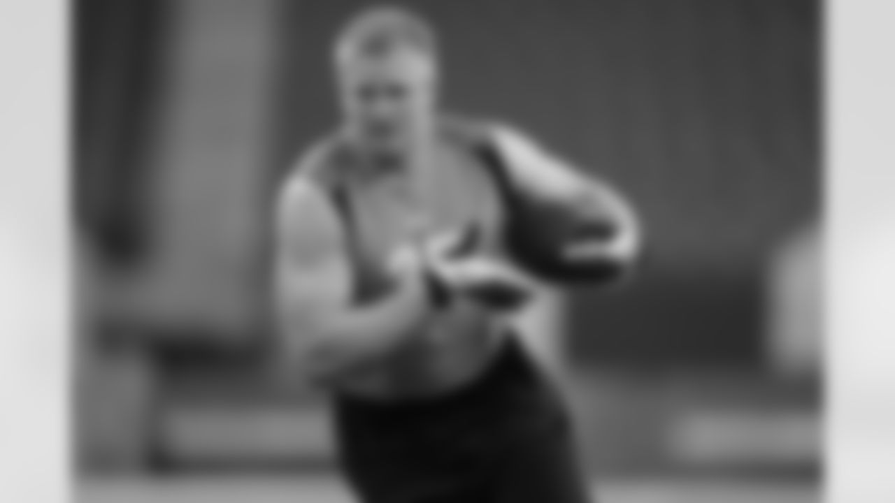 Boise State defensive lineman Shea McClellin runs a drill at the NFL football scouting combine in Indianapolis, Monday, Feb. 27, 2012. (AP Photo/Michael Conroy)