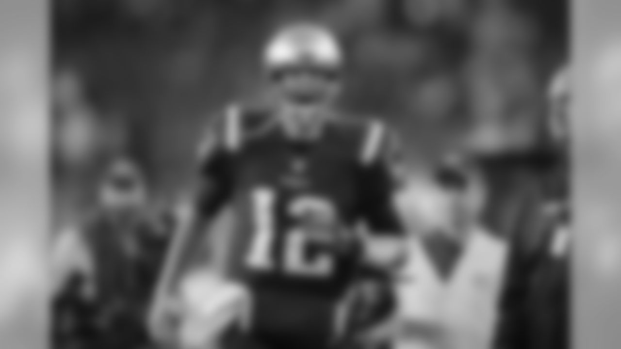 New England Patriots quarterback Tom Brady gets pumped up as he runs onto the field before an NFL football game against the Atlanta Falcons, Sunday, Oct. 22, 2017, in Foxborough, Mass. (AP Photo/Charles Krupa)