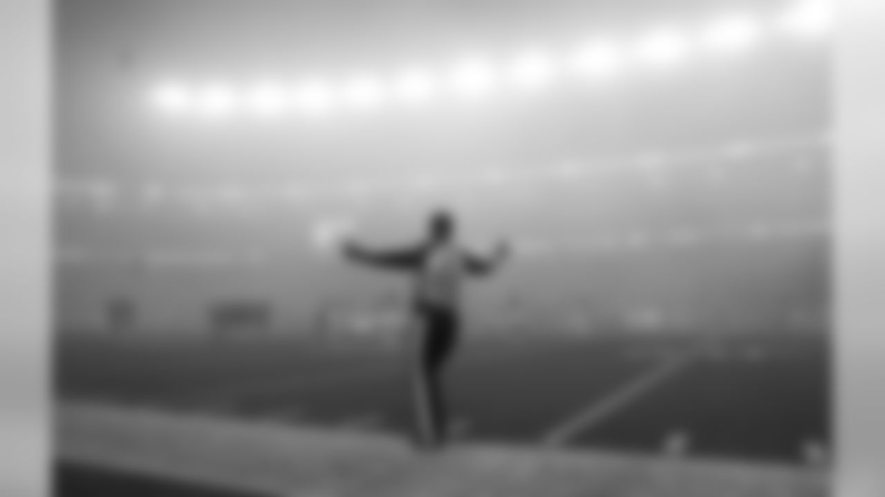 Fog settles over the field as side judge Adrian Hill works along the sideline during the second half of an NFL football game between the New England Patriots and the Atlanta Falcons, Sunday, Oct. 22, 2017, in Foxborough, Mass. (AP Photo/Charles Krupa)