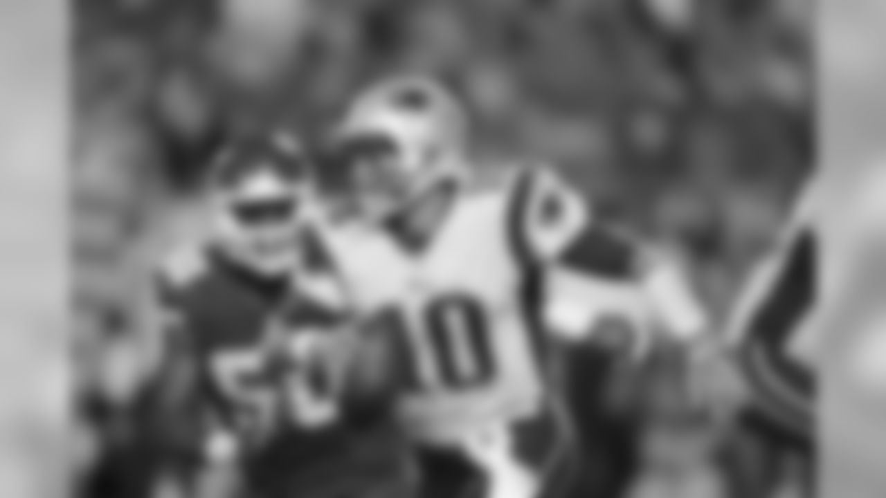 New England Patriots quarterback Jimmy Garoppolo scrambles during the fourth quarter of an NFL football game against the Kansas City Chiefs Monday, Sept. 29, 2014, in Kansas City, Mo.