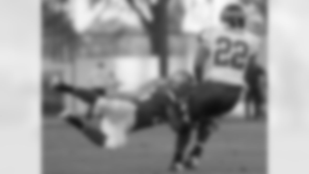 East tight end Clay Harbor, right, of Missouri State, is brought down by West defensive back Darrell Stuckey, from Kansas, during the first half of the East West Shrine football game in Orlando, Fla., Saturday, Jan. 23, 2010.  The East won 13-10. (AP Photo/Phelan M. Ebenhack)