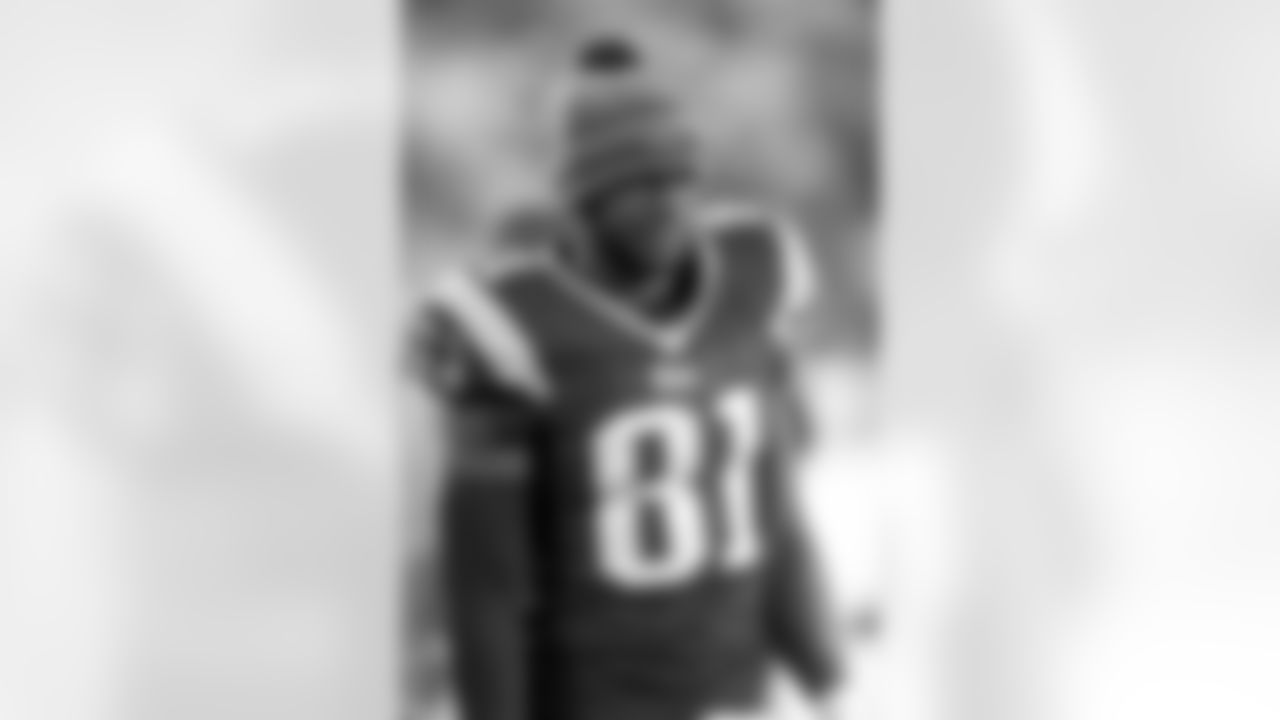 New England Patriots tight end Tim Wright (81) looks up from the sideline with his helmet off during the NFL AFC Championship playoff football game against the Indianapolis Colts, Sunday, January 18, 2015 in Foxborough, Massachusetts. The Patriots won the game 45-7. (AP Photo/Paul Jasienski)