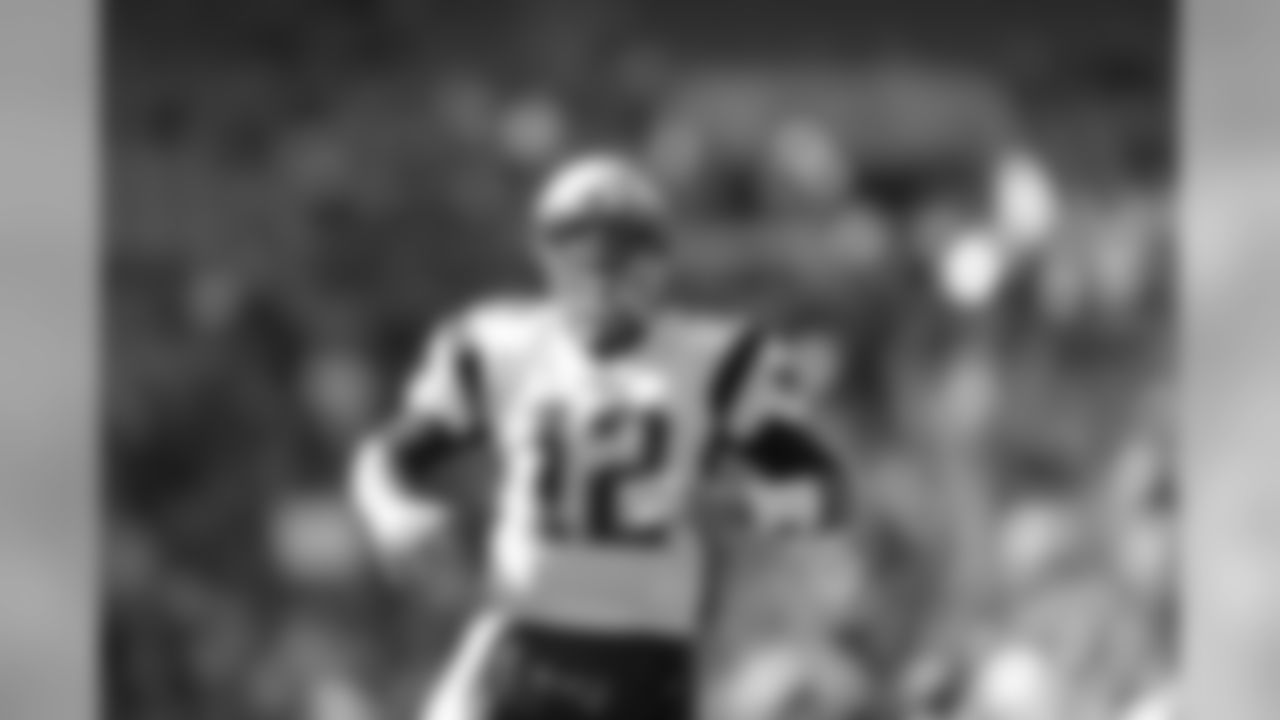 New England Patriots quarterback Tom Brady (12) yells as he makes his way onto the field prior to an NFL football game against the Cleveland Browns on Sunday, Oct. 9, 2016 in Cleveland. (Aaron M. Sprecher via AP)
