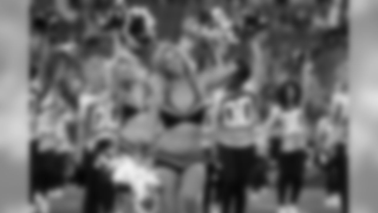New England Patriots cheerleaders and former Patriots cheerleaders perform before an NFL preseason football game between the Patriots and the New York Giants, Thursday, Aug. 31, 2017, in Foxborough, Mass. (AP Photo/Steven Senne)