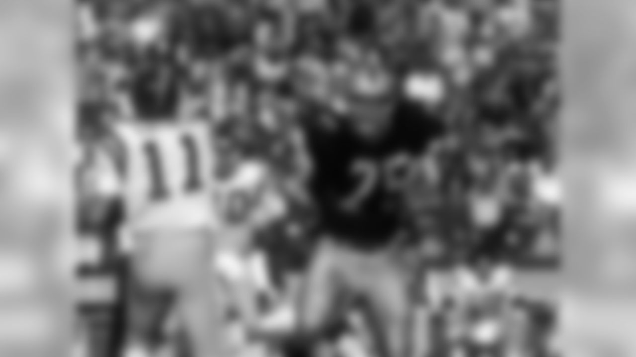 Howie Long applies pressure to the San Diego quarterback during a 1983 contest.
