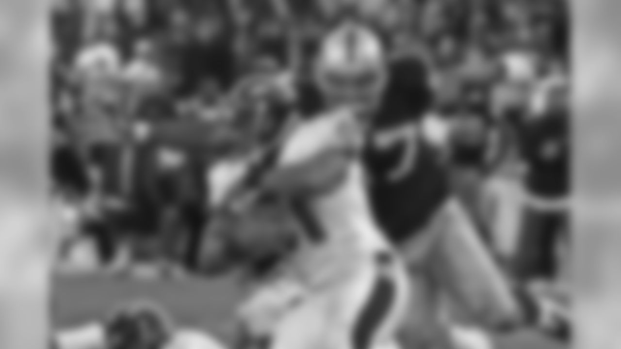 Photos of the Raiders taking on the Baltimore Ravens through the years.