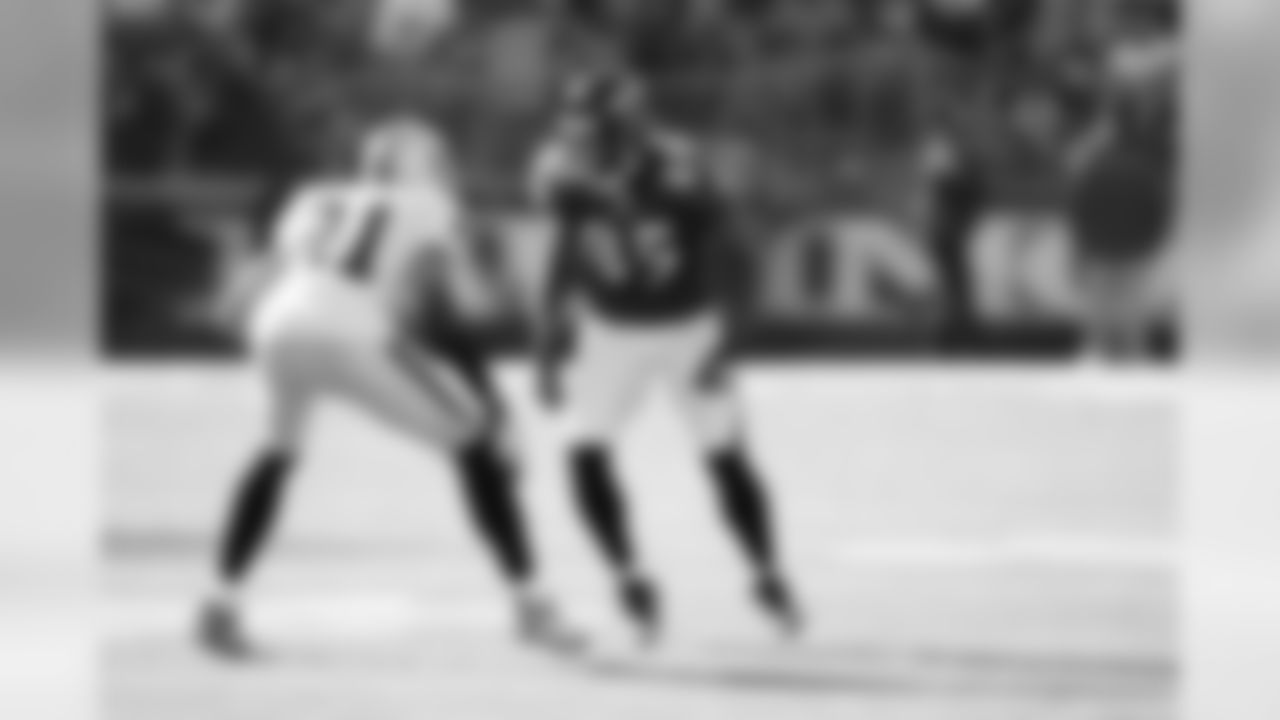 Photos of the Raiders taking on the Baltimore Ravens through the years.