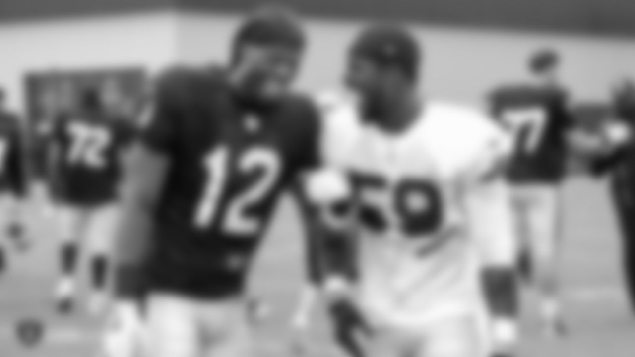 Oakland Raiders wide receiver Martavis Bryant (12) and linebacker Tahir Whitehead (59) on the field for a preseason practice, Tuesday, August 21, 2018, in Alameda, California.