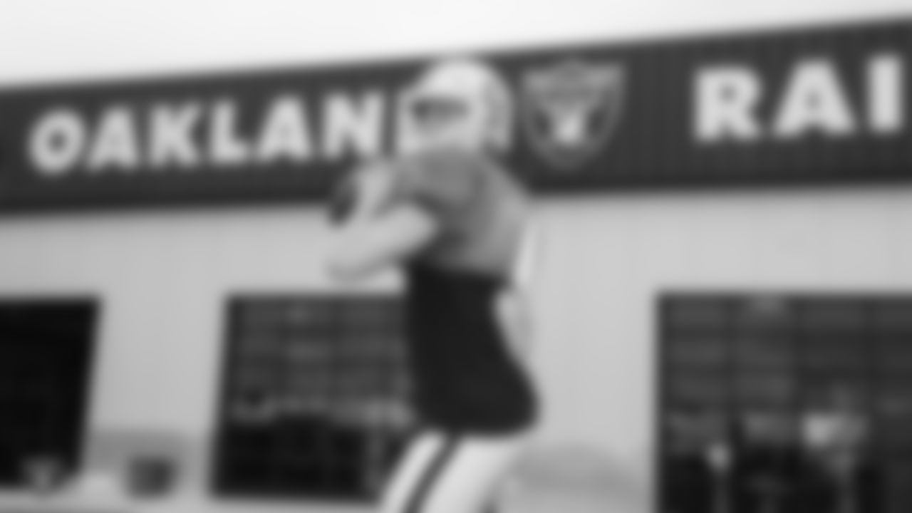 Oakland Raiders quarterback Derek Carr (4) on the field for a preseason practice at the Oakland Raiders Practice Facility, Tuesday, August 21, 2018, in Alameda, California.