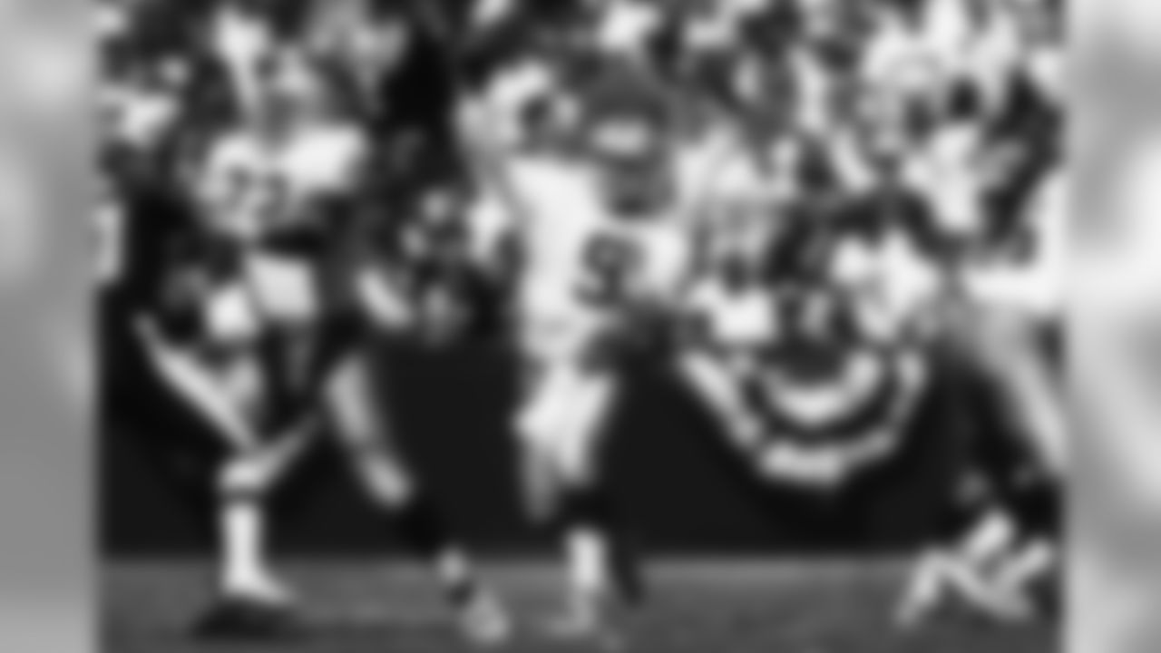 Photos of the Raiders taking on the Baltimore Ravens through the years.