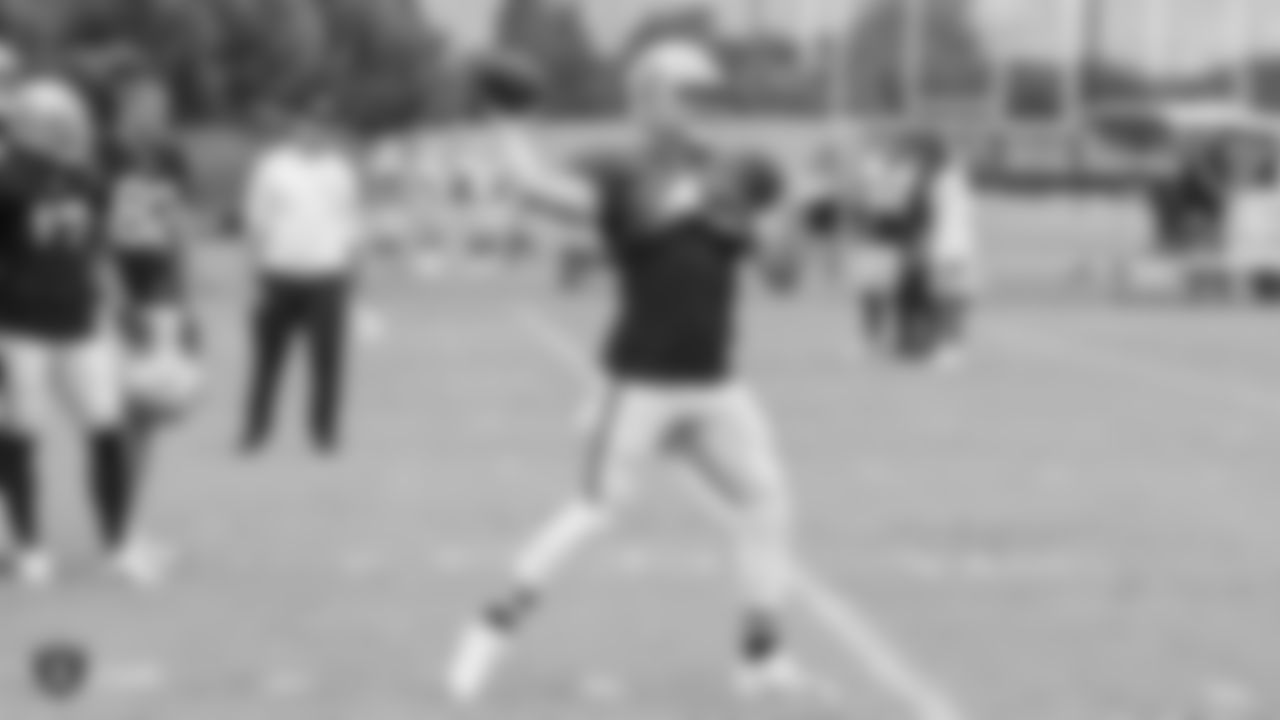 Oakland Raiders quarterback Derek Carr (4) on the field for a preseason practice at the Oakland Raiders Practice Facility, Tuesday, August 21, 2018, in Alameda, California.