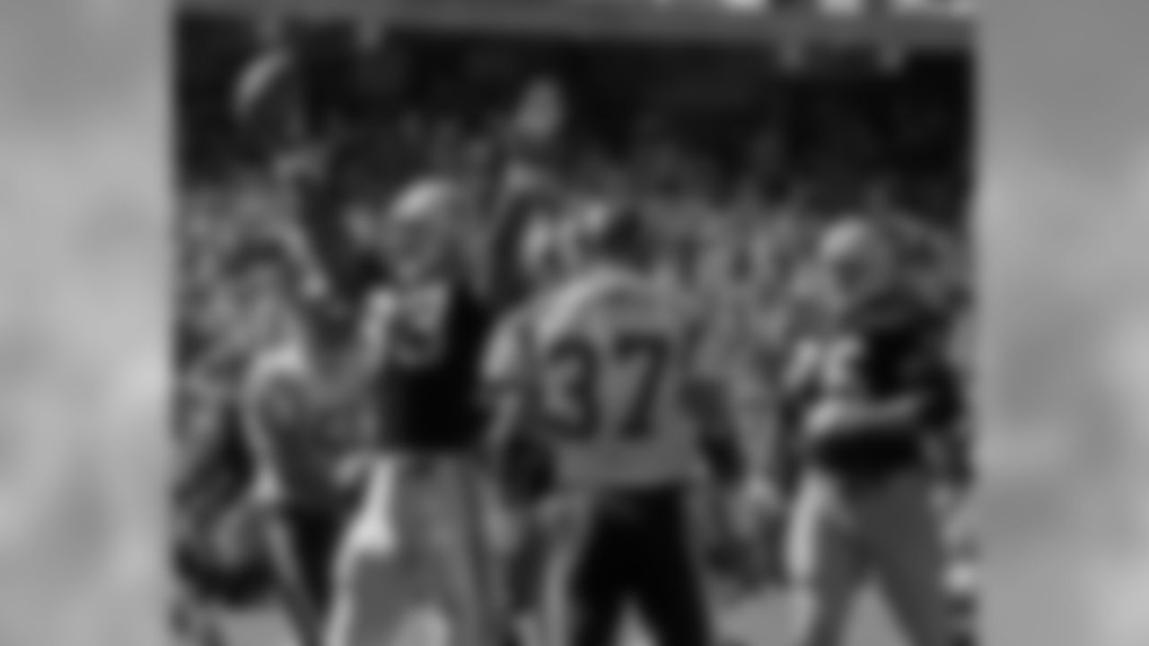 Ricky Dudley celebrates scoring a touchdown during a 1996 match-up with the Chargers.
