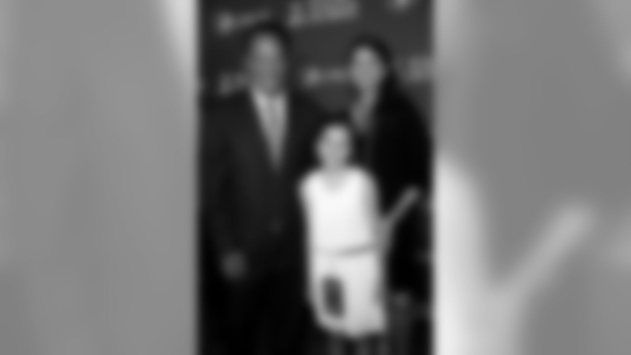 Joani Harbaugh Crean, her husband Tom Crean and their daughter.