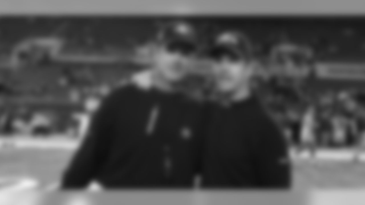 John and Jim Harbaugh during the 2012 Thanksgiving Day game.