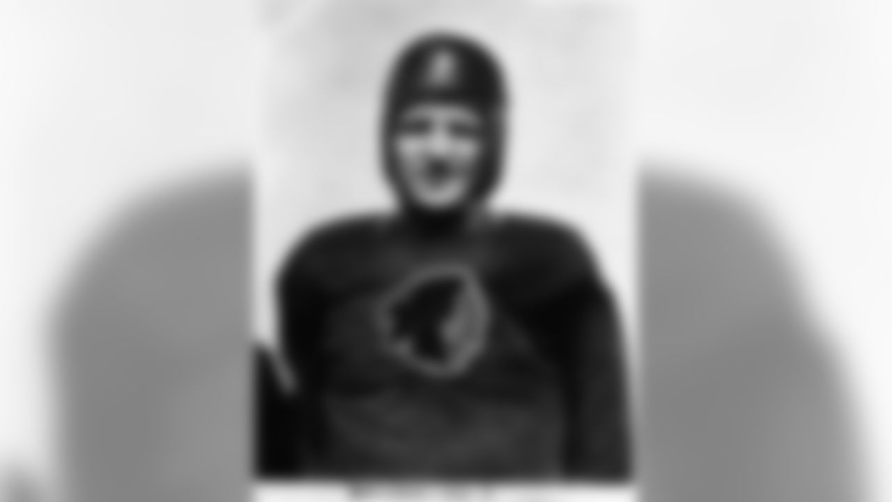 Washington Redskins quarterback Sammy Baugh (33) poses for a photo during training camp at Ballston Park in Virginia, Aug. 8, 1938. (AP Photo/NFL Photos)
