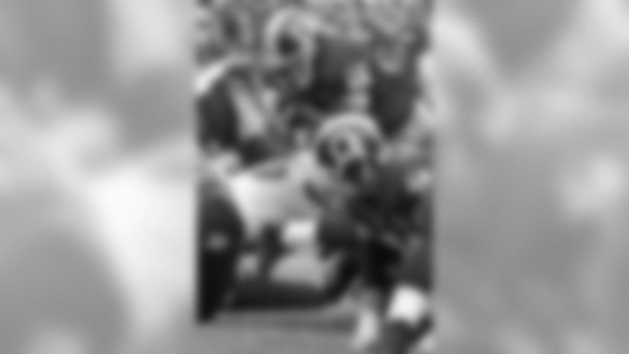 Redskins RB Alfred Morris forces his was into the end zone for a touchdown.