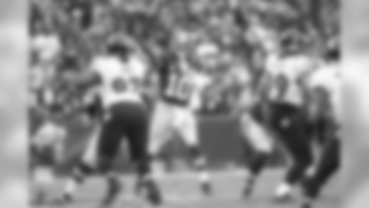 Redskins QB Robert Griffin III throws a pass in the first half.