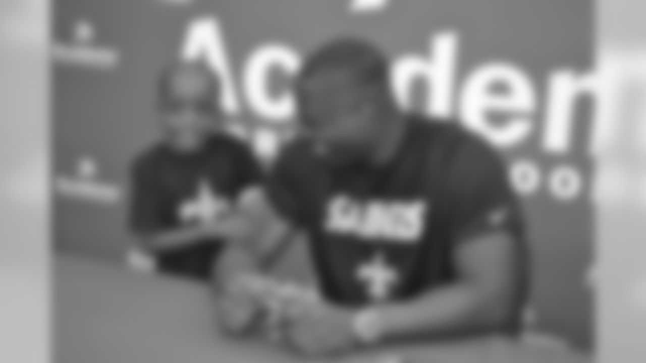 New Orleans Saints tight end Chris Manhertz met with Saints fans and signed autographs at Academy Sports and Outdoors in Kenner.