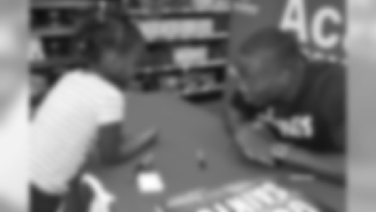 New Orleans Saints tight end Chris Manhertz met with Saints fans and signed autographs at Academy Sports and Outdoors in Kenner.