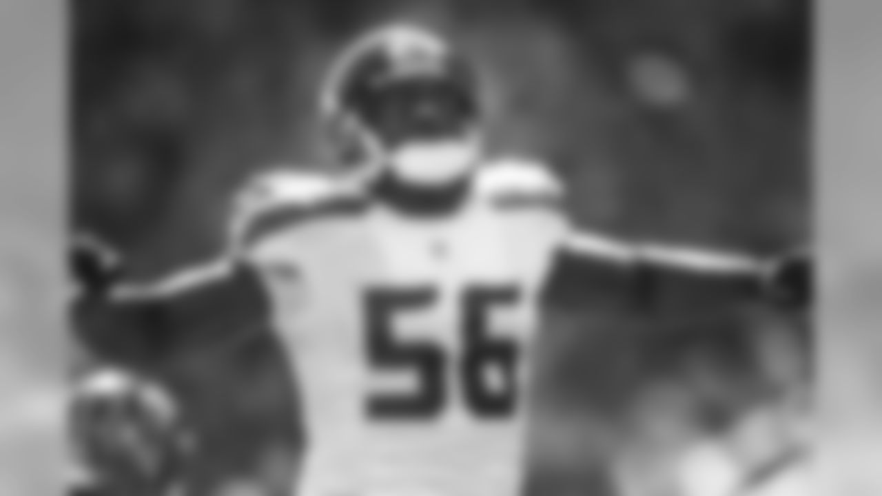 Cliff Avril lets out a yell after a defensive stop in the first half.