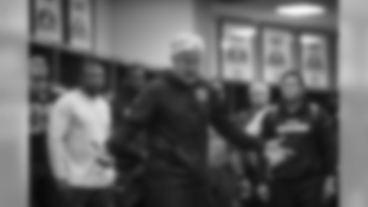 Head coach Pete Carroll talks to his team after the loss to Carolina.