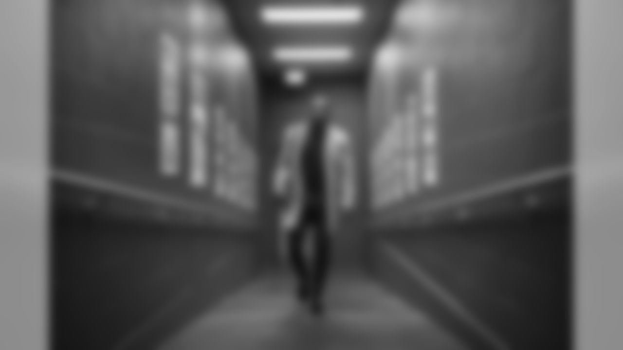 Hours before kickoff of Sunday Night Football, and Seahawks safety Kam Chancellor walks through a hallway connecting the parking garage to the stadium.