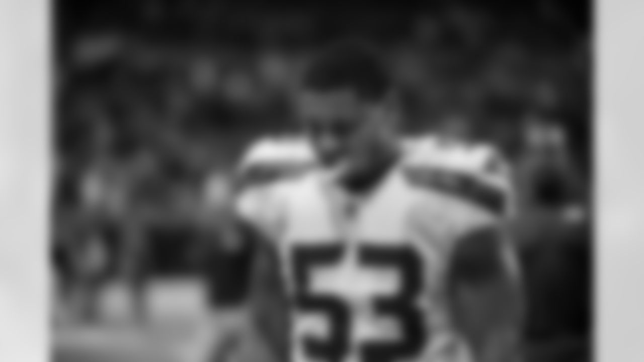 After Seattle's furious rally fell short, linebacker Malcolm Smith walked back to the visitors locker room.