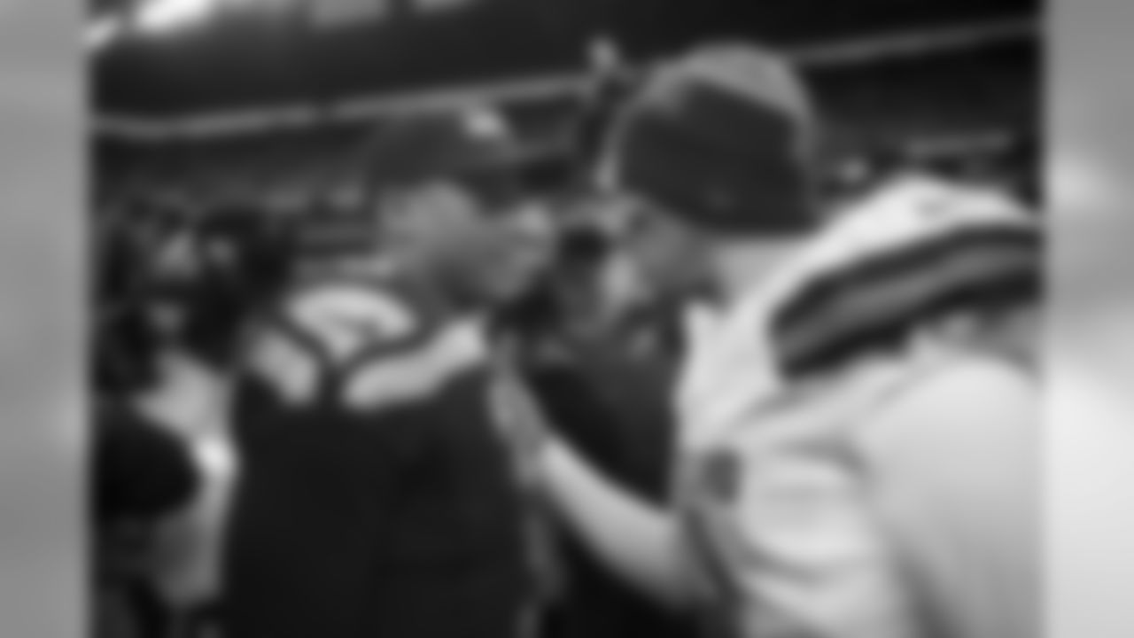 After the game, quarterbacks Russell Wilson and Johnny Manziel met near midfield.