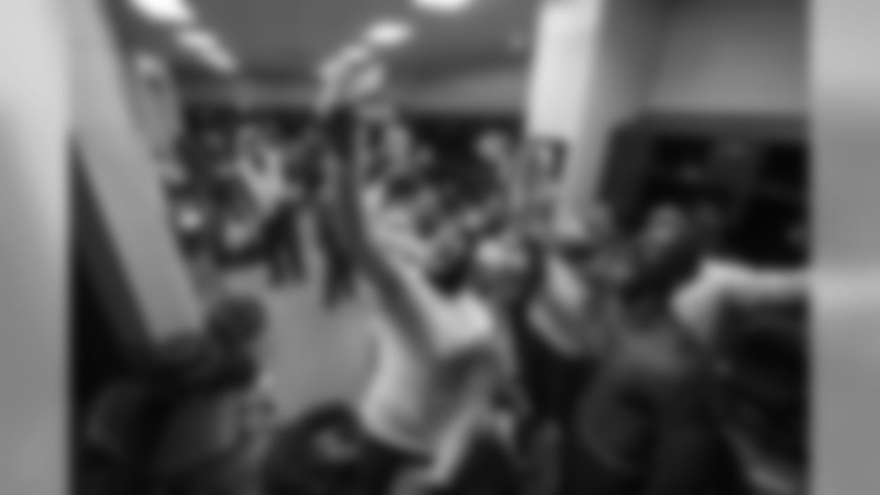 The Seahawks receiving corps poses for a video taken by Jermaine Kearse in the happy locker room after the win over Minnesota in the playoffs.