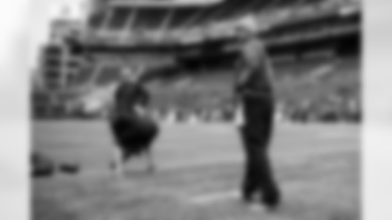 Quarterback Russell Wilson surveys the field as he goes through his typical early pregame routine.
