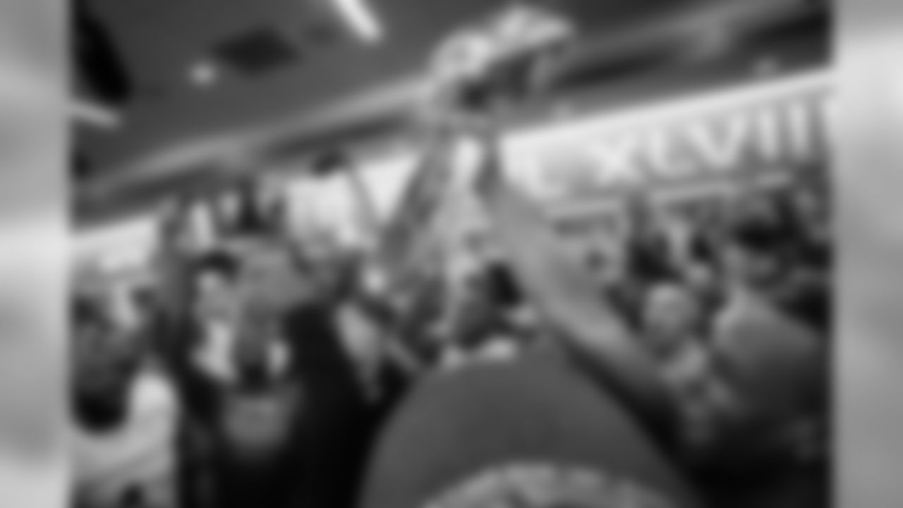 After finally getting the chance to gather the team, head coach Pete Carroll gave his players his postgame talk, then asked them to hold the Lombardi Trophy aloft one more time.