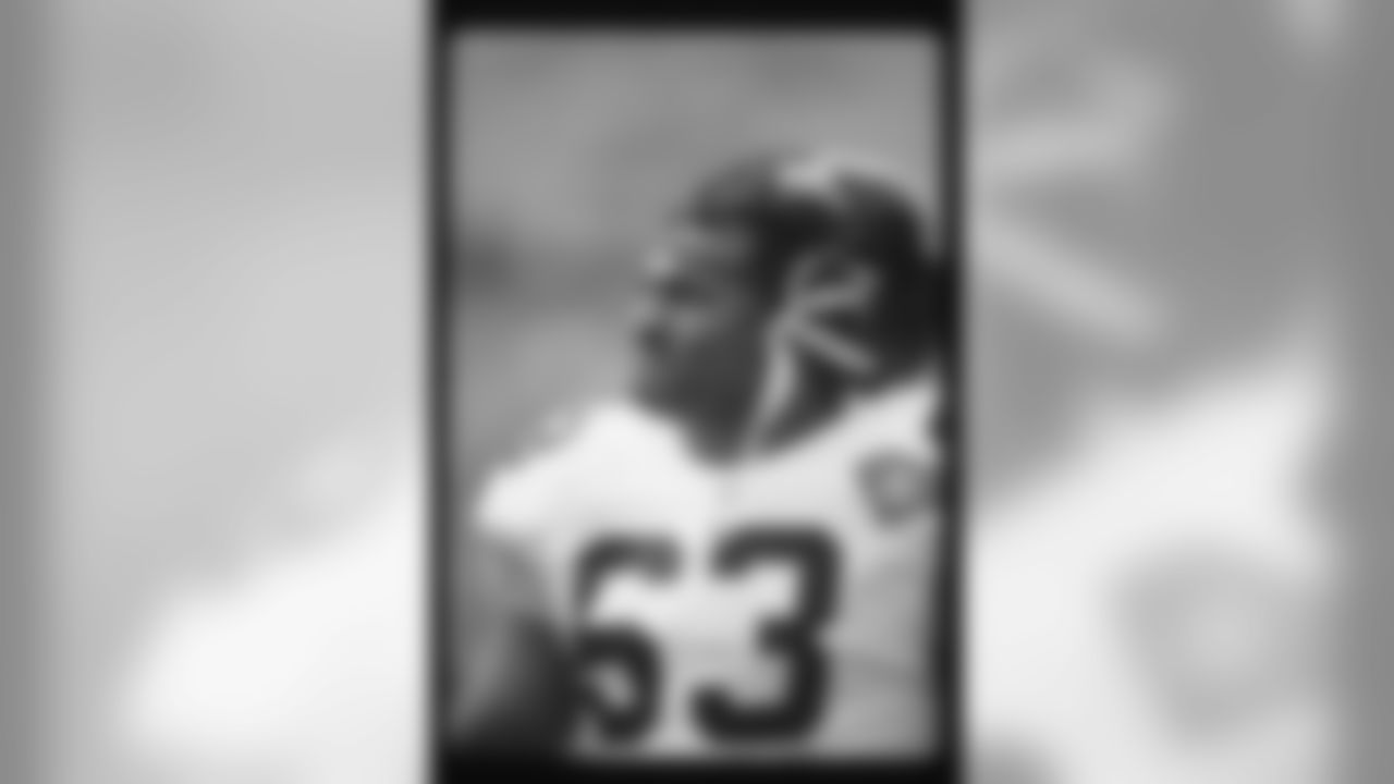 Pittsburgh Steelers offensive center Dermontti Dawson (63) looks up from the field with his helmet up during a NFL football game against the Seattle Seahawks on September 25, 1994 in Seattle. The Seahawks won the game 30-13. (AP Photo/Paul Jasienski)