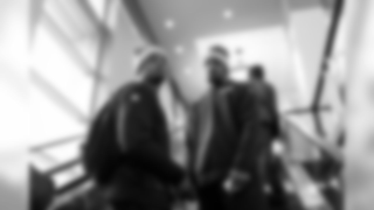 Receivers Doug Baldwin and Jalen Saunders do their best "mean mugging" on the hotel escalator upon the team's return to the hotel. Seconds after the photo was snapped, both broke into laughter.
