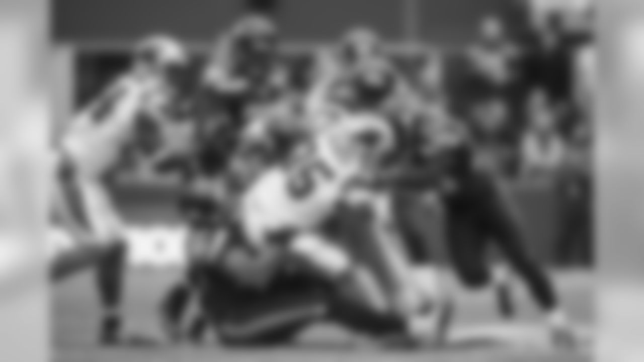 The Seahawks gang tackle Carolina's Mike Tolbert in the second quarter. In on the tackle are K.J. Wright, Kevin Pierre-Louis, Kam Chancellor and Earl Thomas.