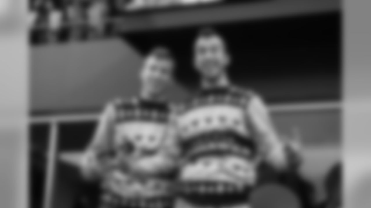 These two fellows were already in the holiday spirit and rocked matching Seahawks sweaters on a chilly and rainy November day.