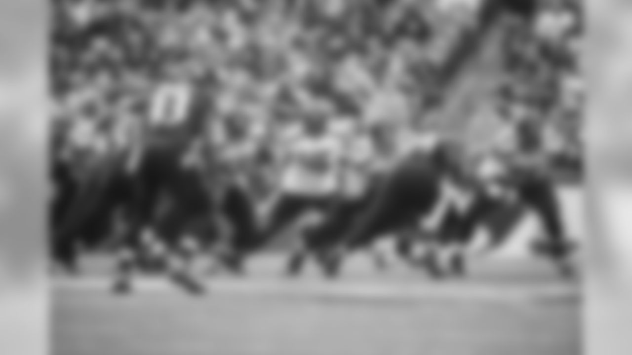Back on the field, Seattle's offensive line was getting it done in both the rushing and passing games. From left are center guard J.R. Sweezy, Patrick Lewis, fullback Will Tukuafu, guard Justin Britt and tackle Russell Okung.