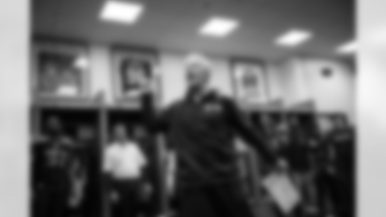 Pete Carroll gives a fired-up post-game speech to his players and coaches in the locker room.