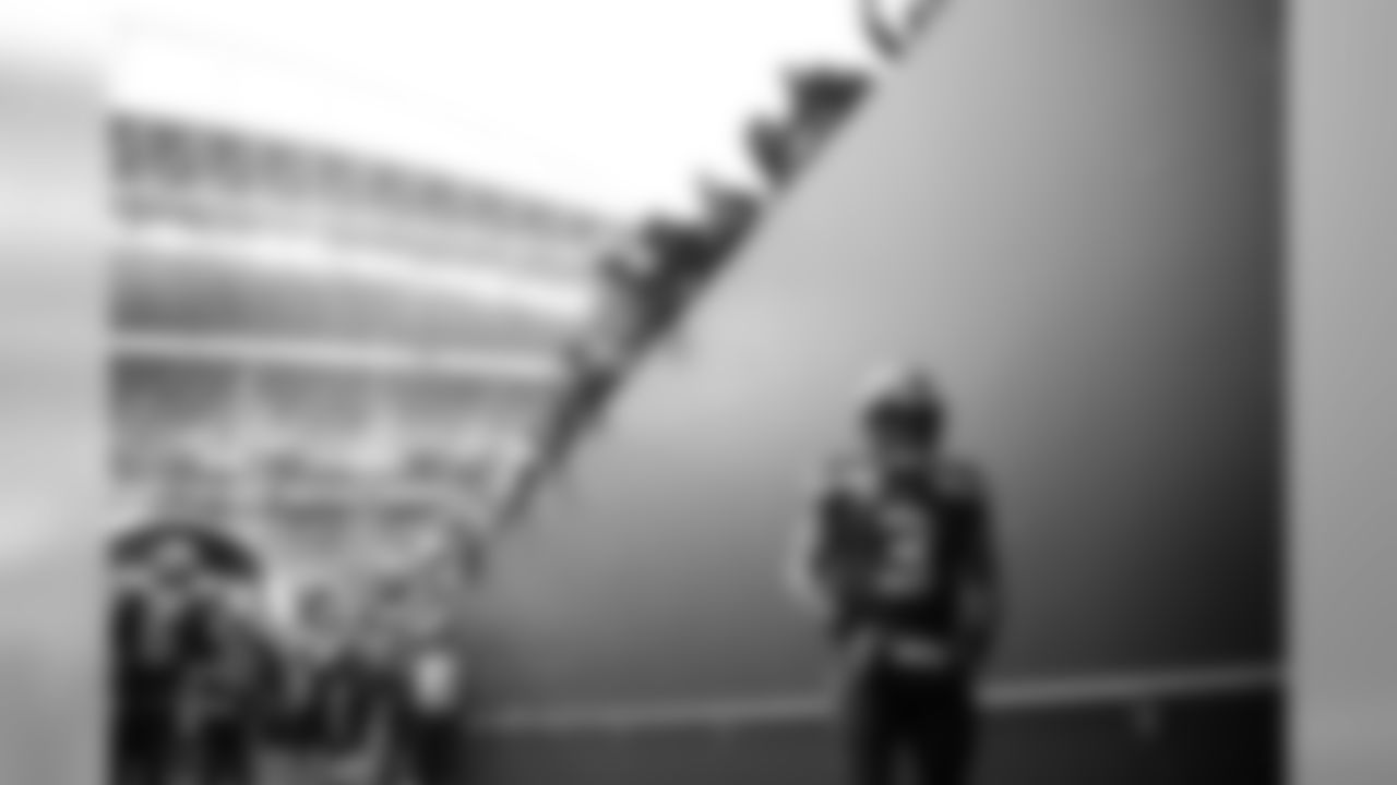 Quarterback Russell Wilson waits for the last of his teammates to emerge from the locker room prior to pregame introductions.
