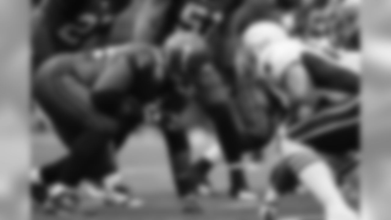 Brandon Mebane lines up and prepares to rush the QB.