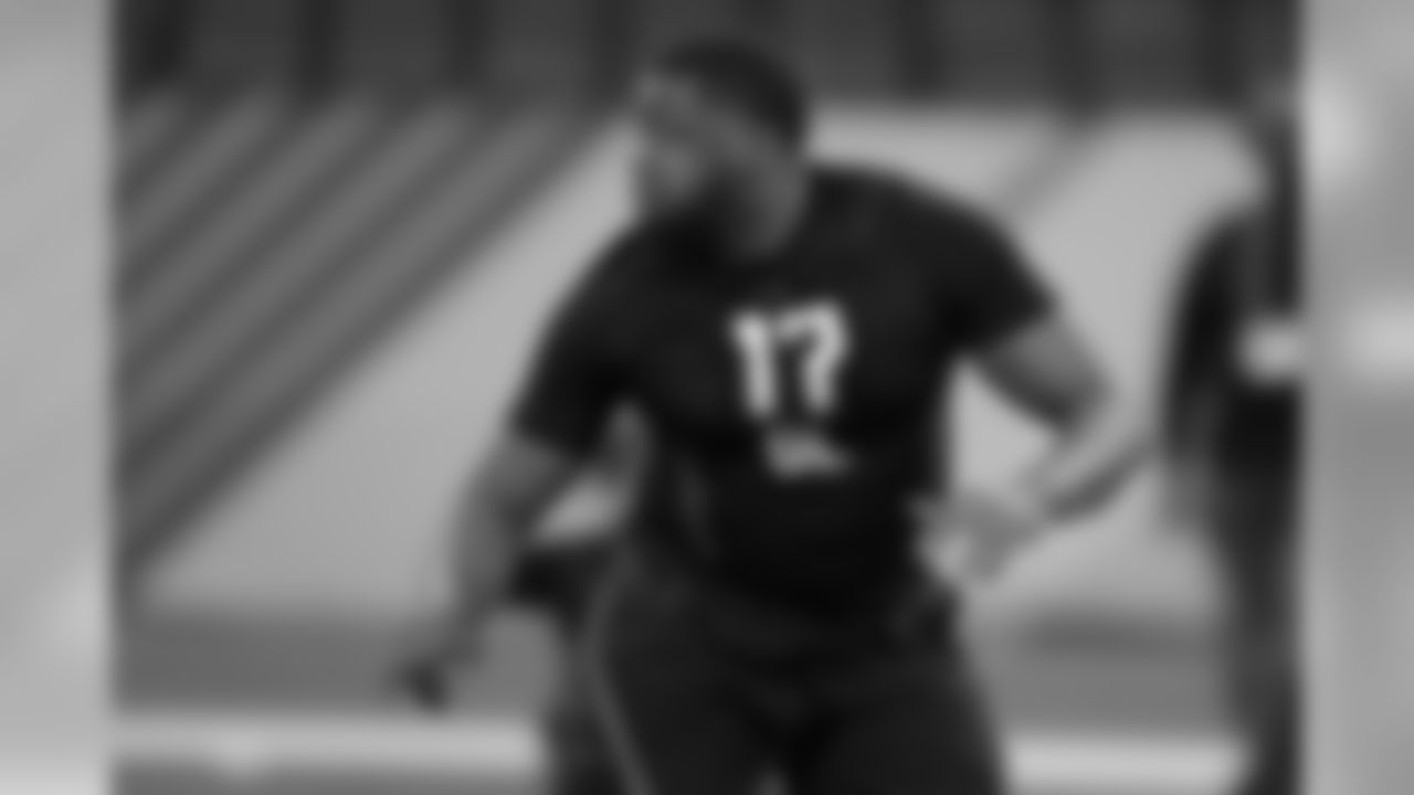 Ohio State offensive lineman Jamarco Jones runs a drill at the NFL football scouting combine in Indianapolis, Friday, March 2, 2018. (AP Photo/Michael Conroy)