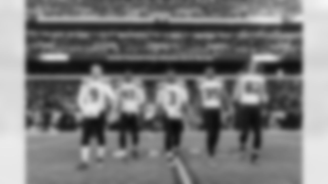 Seahawks captains Jon Ryan, Byron Maxwell, Russell Wilson, DeShawn Shead and Luke Willson head to midfield for the coin toss.