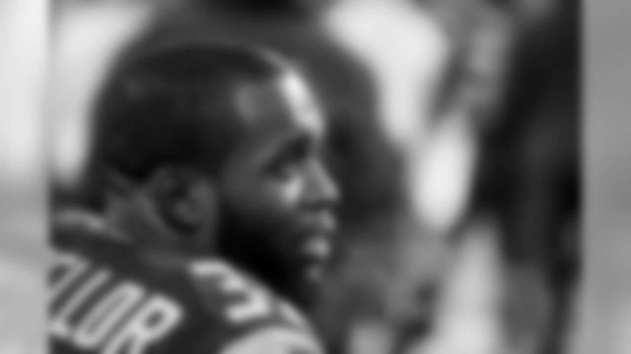 Strong safety Kam Chancellor rests on the bench after his interception.