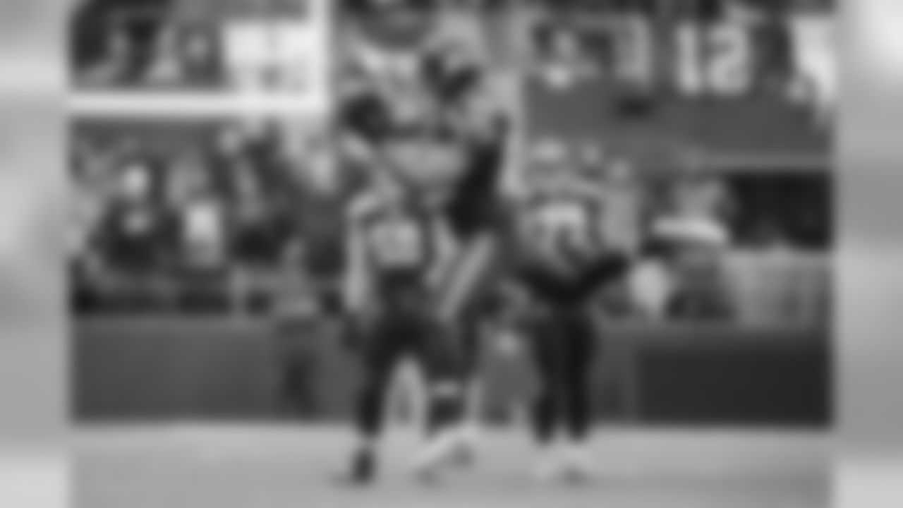 Seattle receiver Doug Baldwin continued his fine play, leaping high to corral this pass from Russell Wilson, which he turned into a 28-yard gain, his longest of the day.