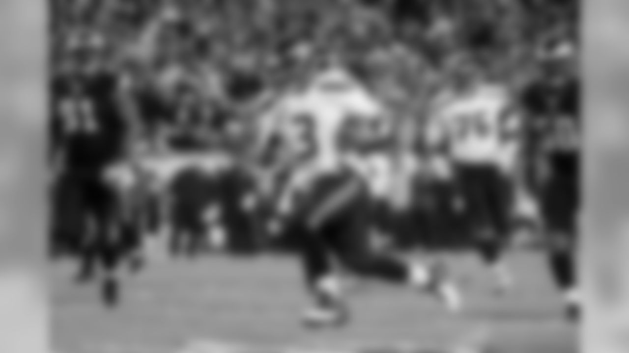 Russell Wilson got the Seahawks on the board with 26-yard rushing touchdown in which he raced to the end zone untouched after keeping the ball on a read-option play.