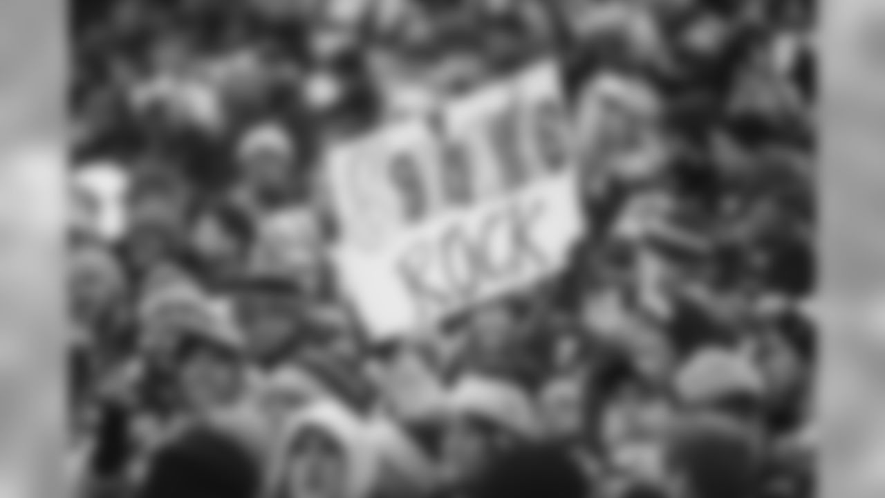 Seahawks fans once again showed up and showed out on the road, flooding the stadium in blue and green, with 12 flags and signs supporting their team.